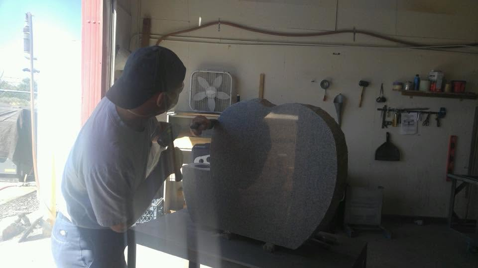 Adam working on heart monument