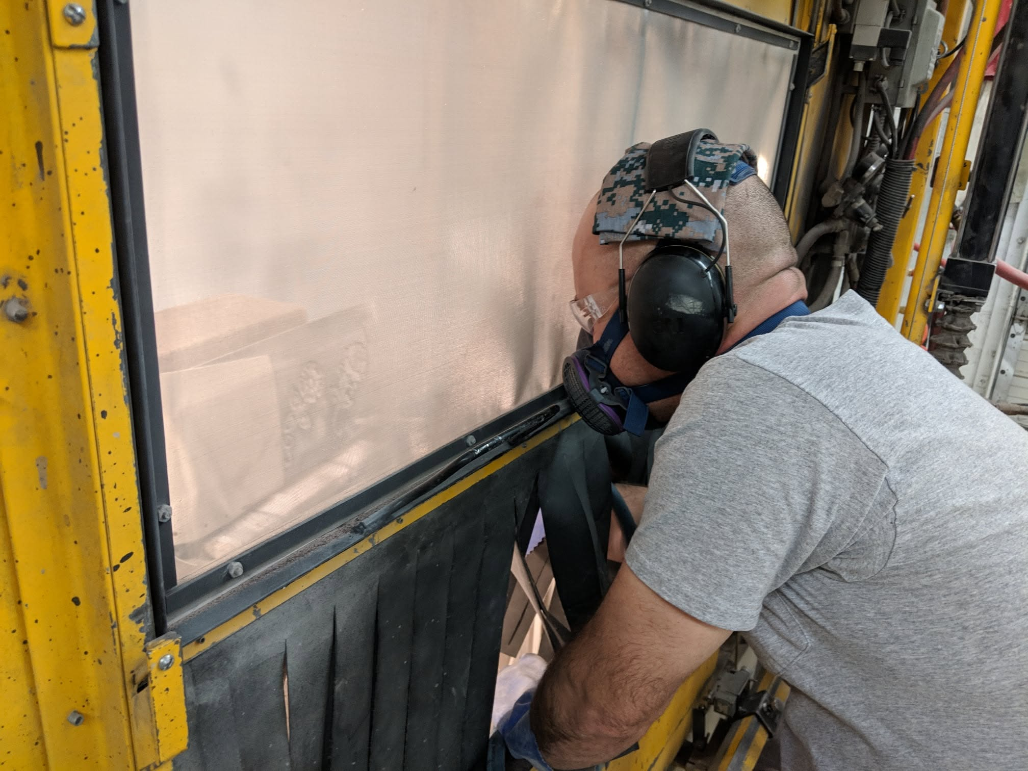 Adam sandblasting close-up
